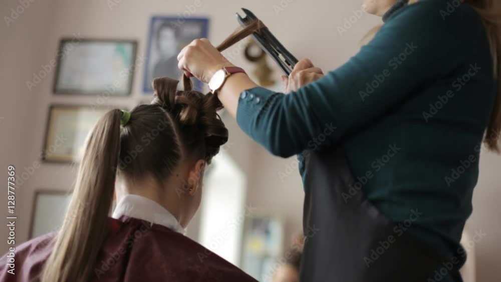 Stylist, Hairdresser is Making The Hairstyle For a Woman with Long Hairs, Combing the Wet Hairs before making a hairstyle, hairdresser's hands close up, hairs close up, Red Earrings, Barbershop, Stylist, Hairdresser is Making The Hairstyle For a Woman with Long Hairs, Combing the Wet Hairs before making a hairstyle, hairdresser's hands close up, hairs close up, Red Earrings, Barbershop,