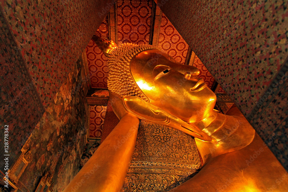 The big Buddha statue is sleeping in the temple at bangkok, Thaiand