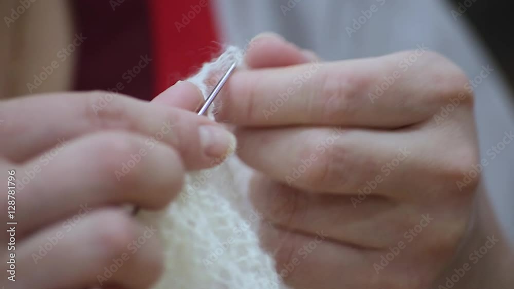 Close-up of hands knitting Close-up of hands knitting