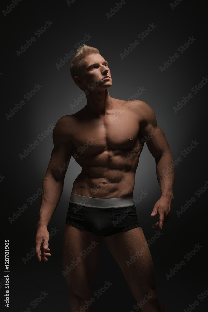 Advertising underwear. Photo of sexy man in briefs