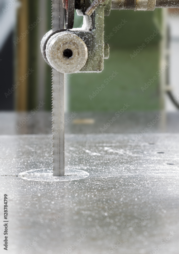 Blade of band saw machine on metal board Blade of band saw machine on metal board