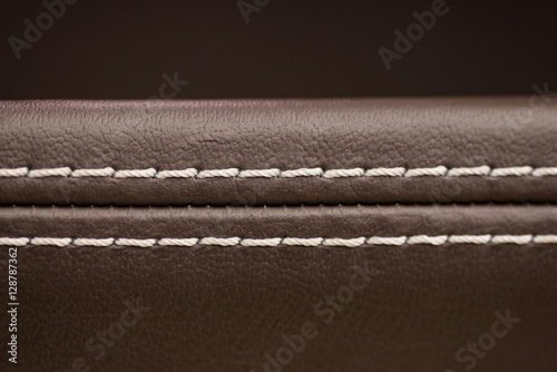 Leather background. Car interior detail. Macro photo. photo