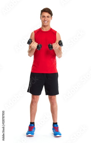 athletic young man with dumbbells