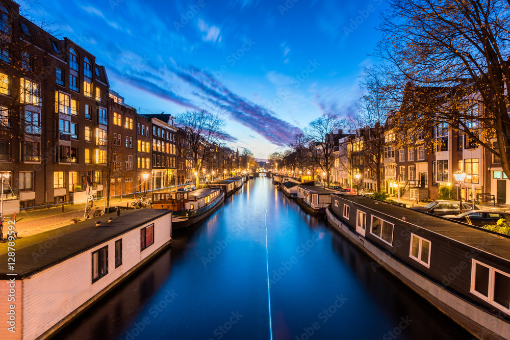 Canal with House Boats in Amsterdam Netherlands