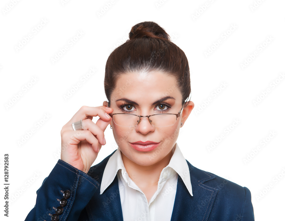 Businesswoman  wearing glasses looking at camera.