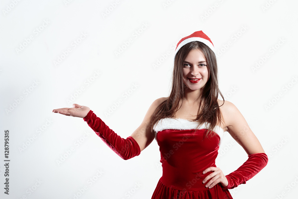 sexy santa girl holding empty space, isolated on white background sexy santa girl holding empty space, isolated on white background