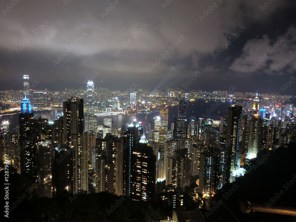 Hong Kong city skyline illuminated at night from the peak