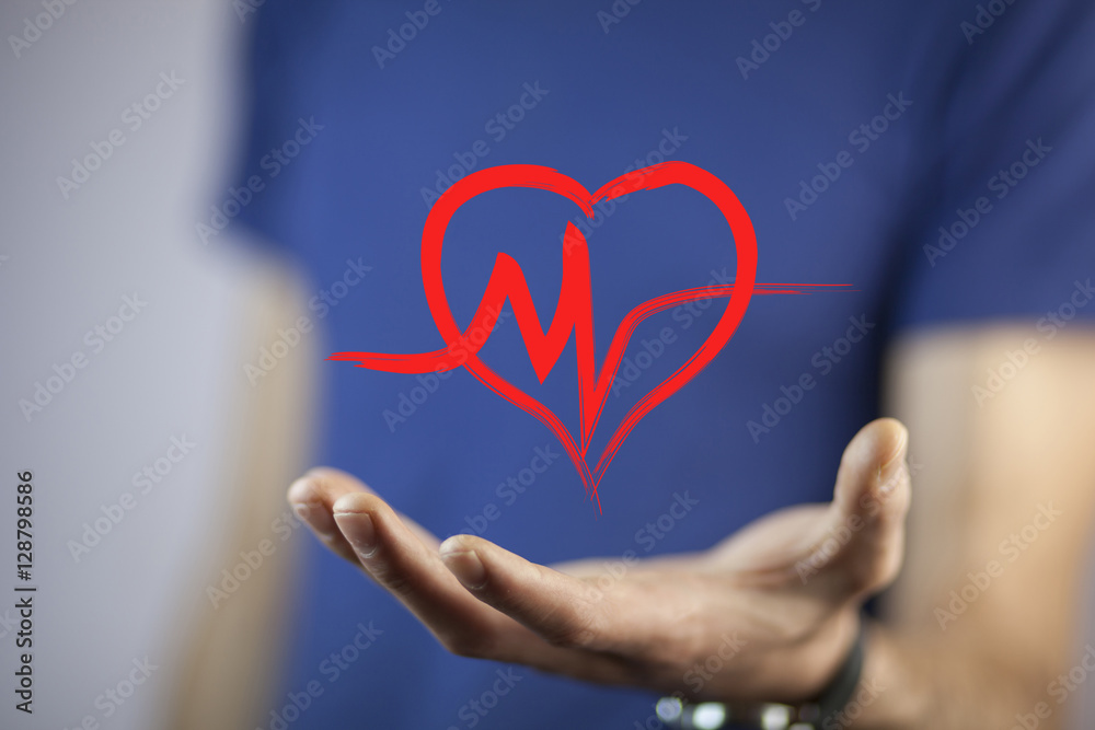 man holding a heart in his hands man holding a heart in his hands