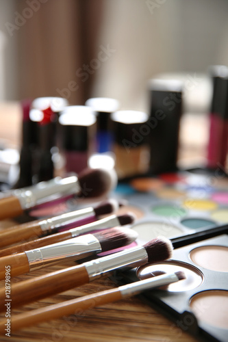 Professional make-up accessories on table