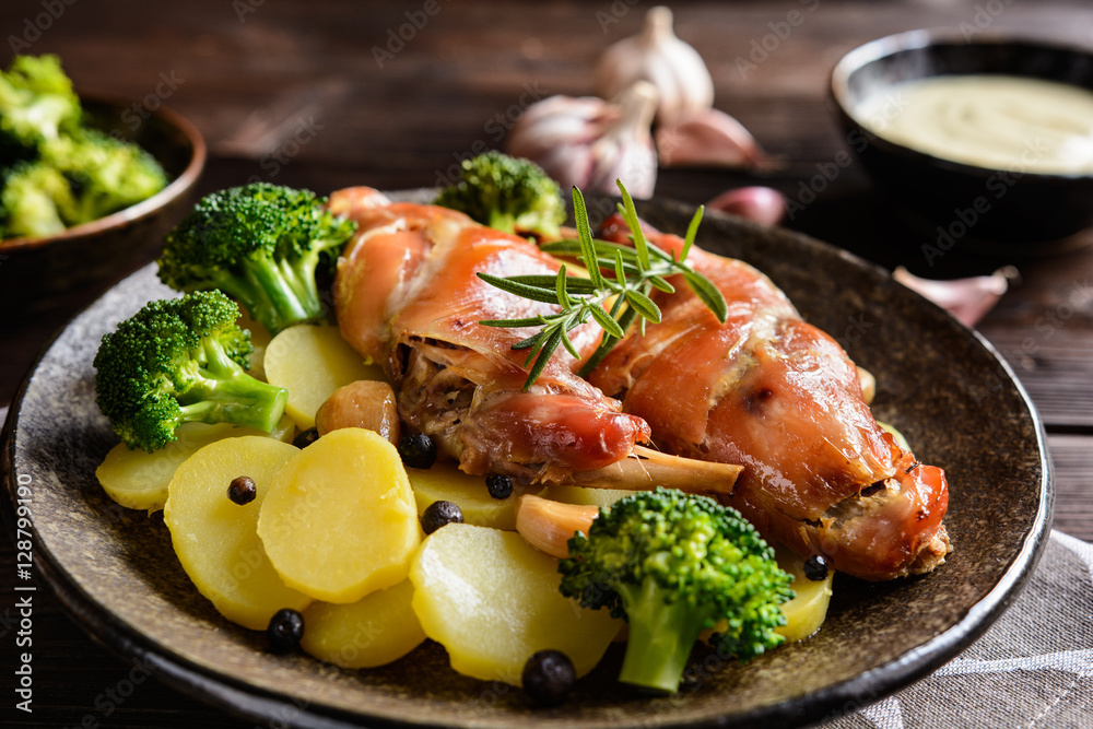 Roasted rabbit meat with potato and broccoli Roasted rabbit meat with potato and broccoli