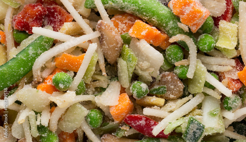 Frozen vegetables in a white plate.