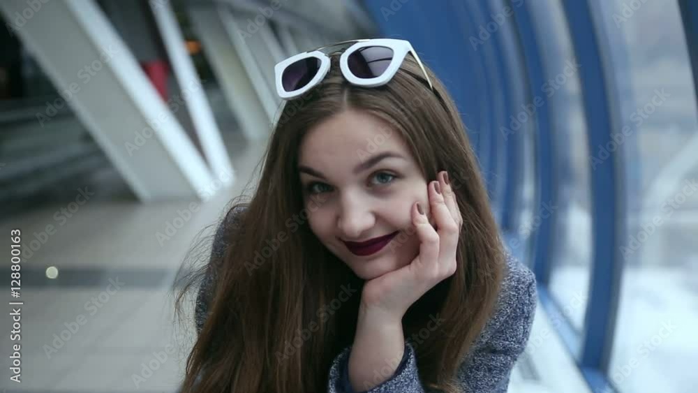 Girl with sunglasses playing and flirting Girl with sunglasses playing and flirting