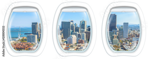 Photography Three plane windows on San Francisco Financial District Downtown, California, United States, from a plane on the porthole windows