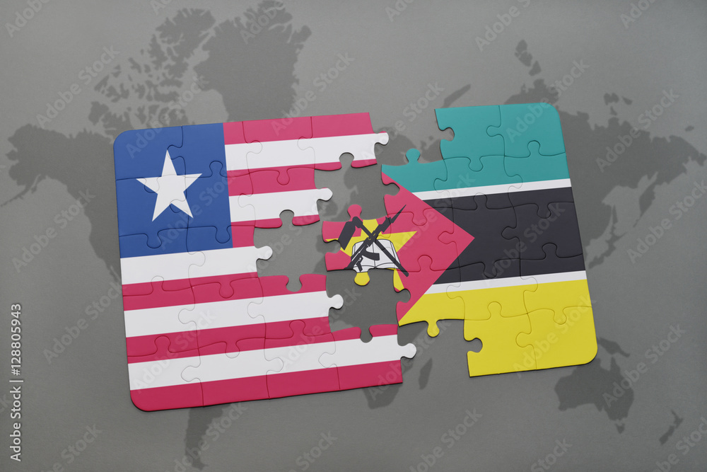 Obraz premium puzzle with the national flag of liberia and mozambique on a world map