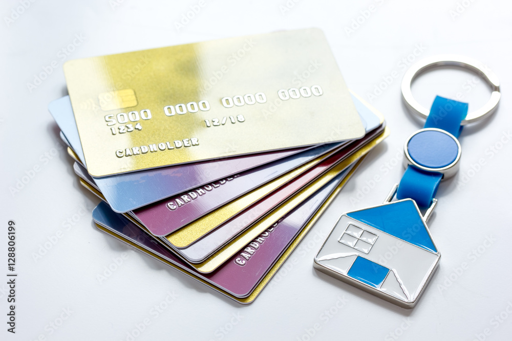 credit cards, key ring - concept mortgage on white background credit cards, key ring - concept mortgage on white background