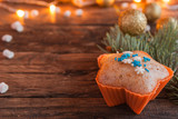 Christmas Cupcakes on Wooden Background. Horizontal.