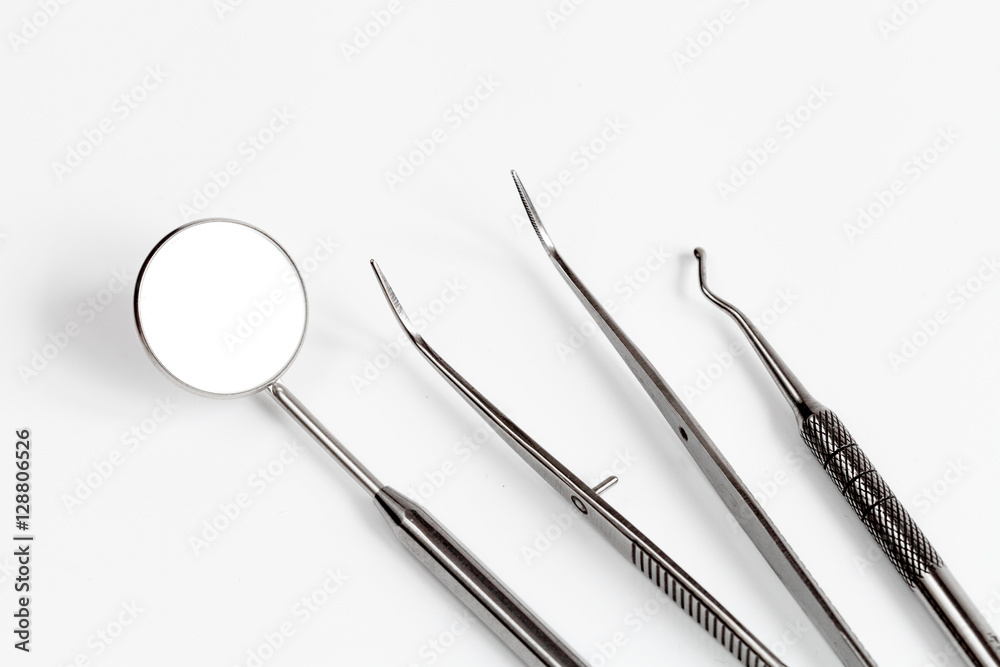 dental tools on white background top view dental tools on white background top view