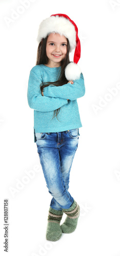 Cute little girl in Santa h...