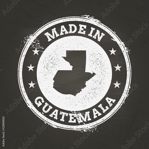White chalk texture stamp of the Republic of Guatemala map on a black schoolboard, creating a grunge rubber seal effect.