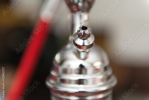 Several Hookahs Lined Up In A Cafe Bar