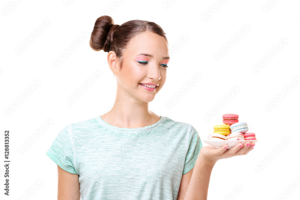 Cute girl with macaroons on white background Cute girl with macaroons on white background
