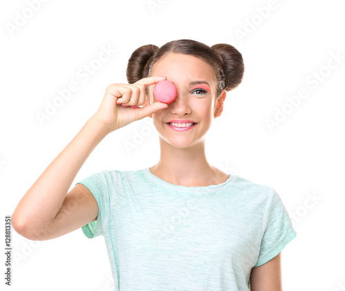 Cute girl with macaroon on ...
