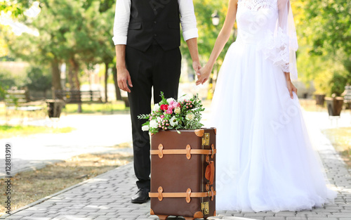 Vintage suitcase and groom ...