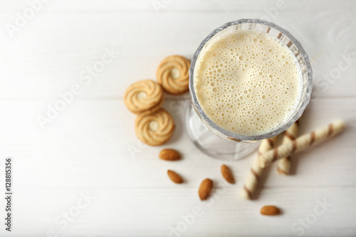 Fresh milk cocktail on wooden background