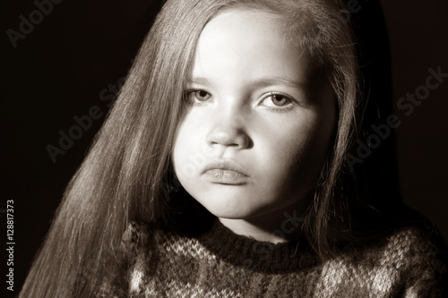 Portrait of cute little gir...