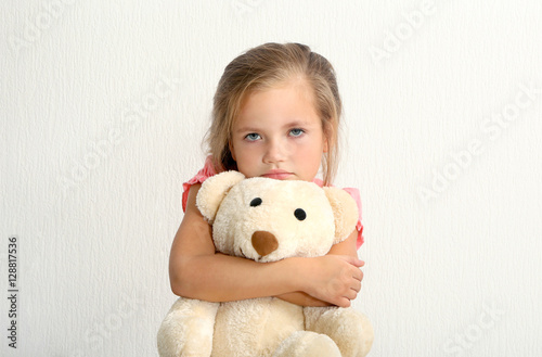 Cute little girl with teddy...