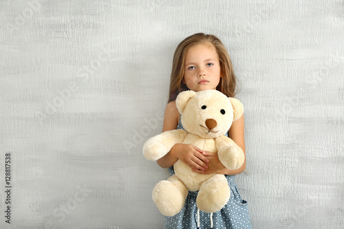 Cute little girl with teddy...