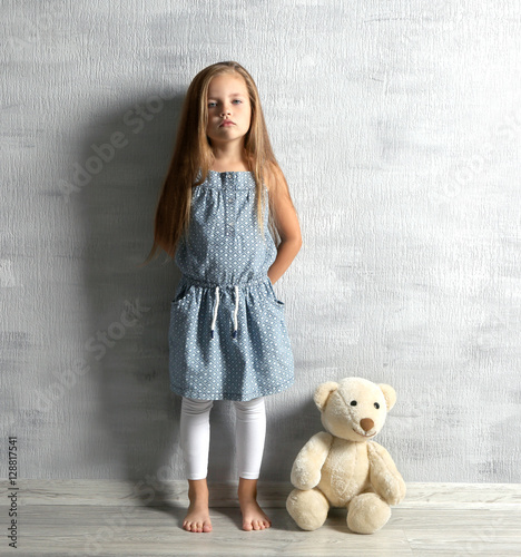 Cute little girl with teddy...