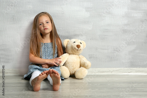 Cute little girl with teddy...
