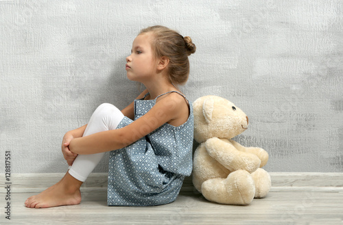 Offended little girl with t...