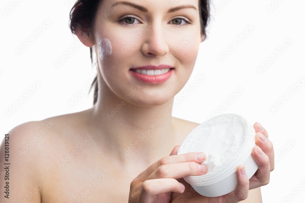 Woman applying a cream Woman applying a cream