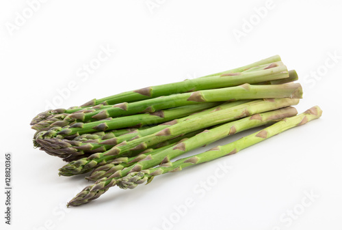 Fresh green asparagus spears on white background