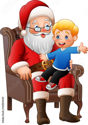 Santa Claus sitting with a little cute boy