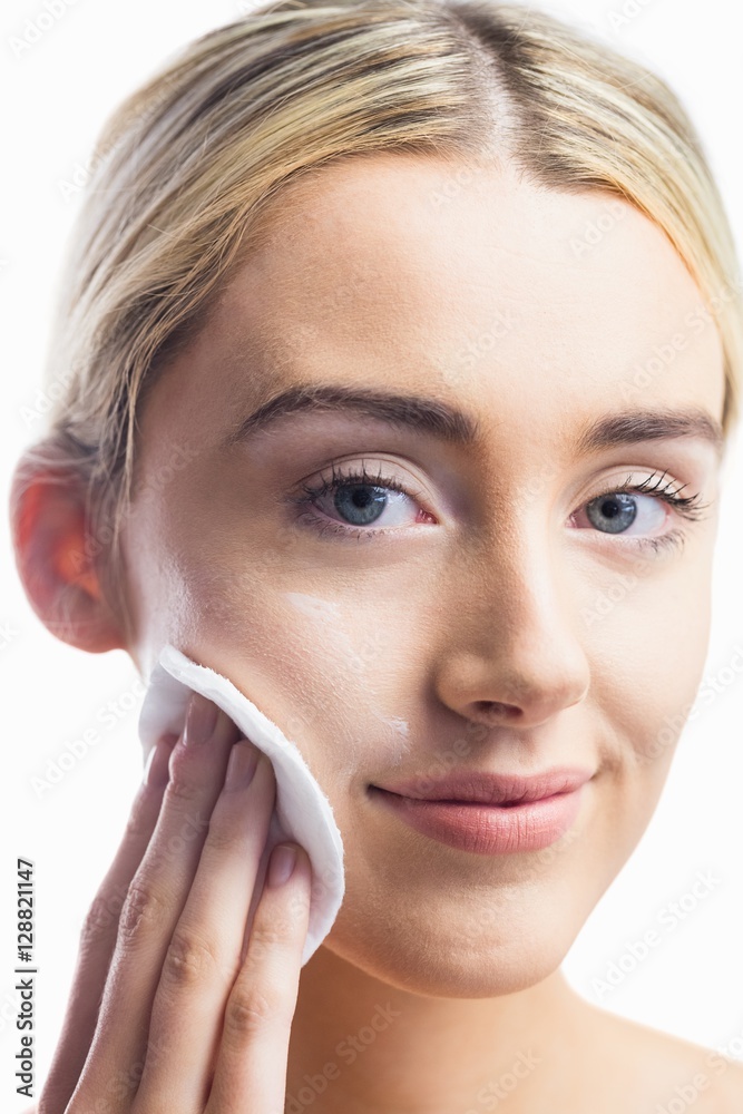 Beautiful woman putting makeup 