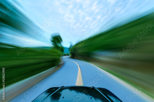 Asphalt road through the forest