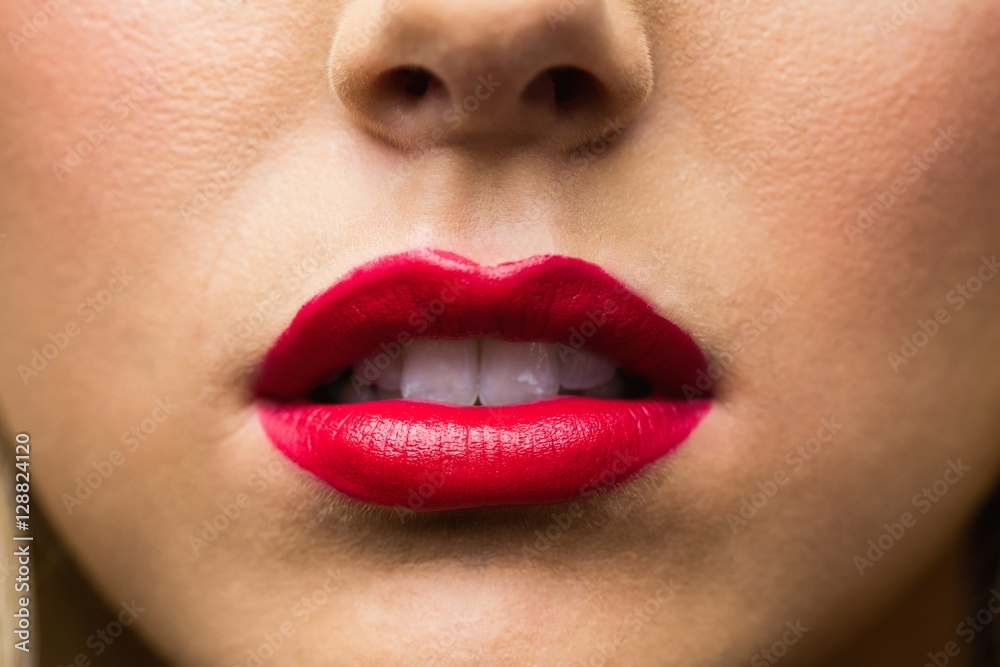 Naklejka premium Close up of lips with makeup on them