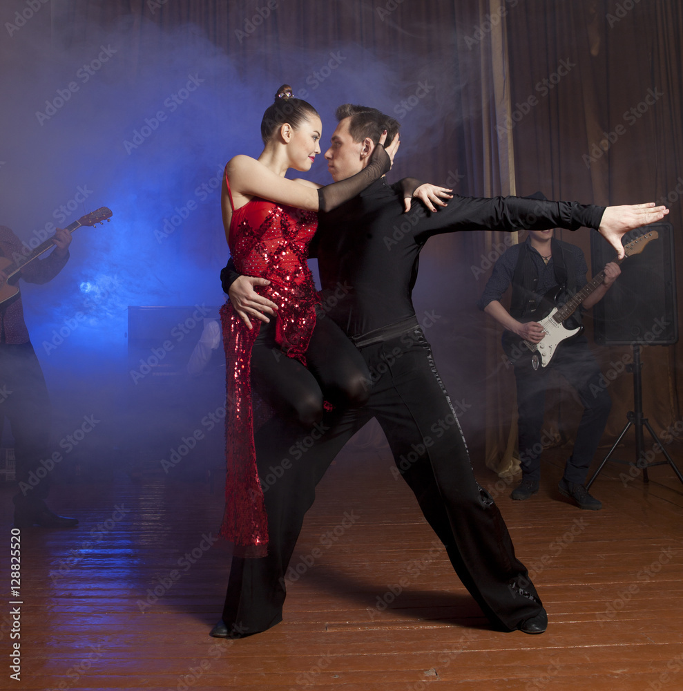Fototapeta premium Beautiful couple in the active ballroom dance