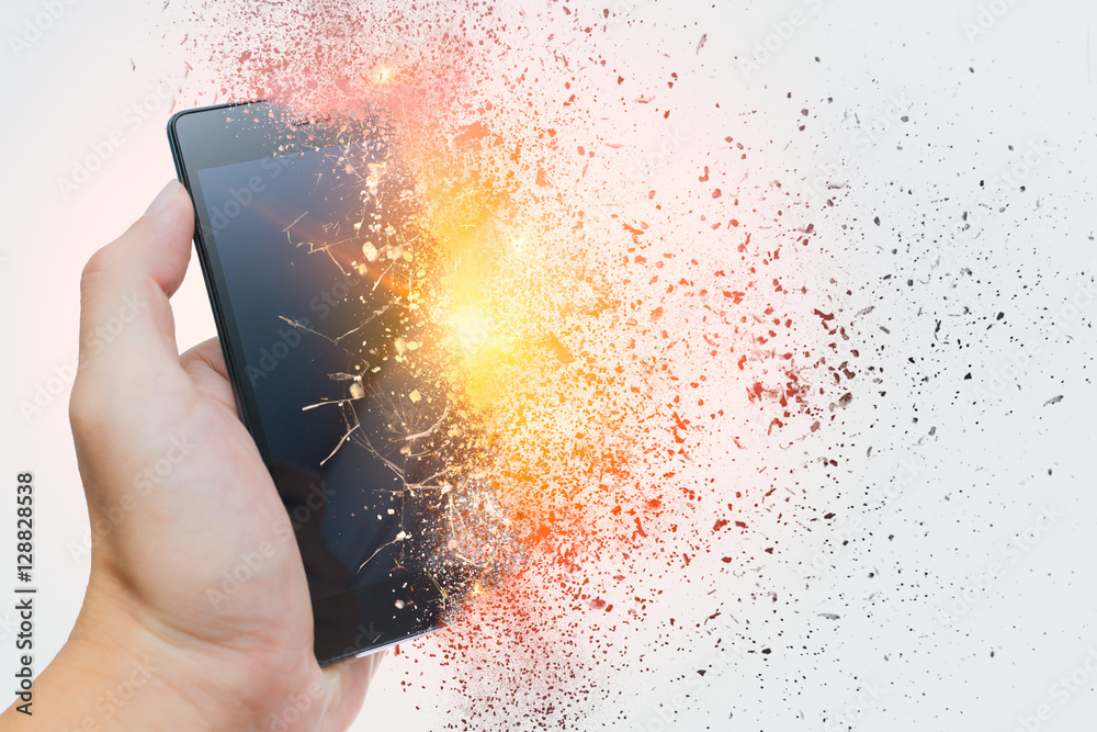 Foto Stock smartphone explosion, blow up cellphone battery or explosive  mobile phone or explode burst fire burn out smart device with dispersion  effect. | Adobe Stock
