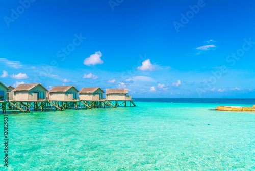 Fototapeta Naklejka Na Ścianę i Meble -  Beautiful water villas in tropical Maldives island  .