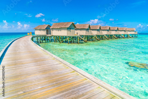 Beautiful water villas in tropical Maldives island  .