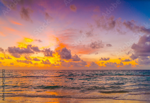 Beautiful sunset with sky over calm sea  in tropical Maldives is © jannoon028