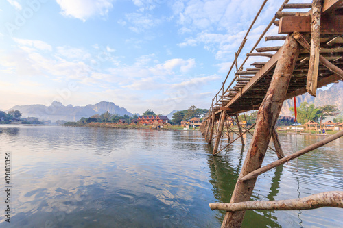 Wooden bridge across Nam Song river to riverside guesthouse at Vang vieng  Laos