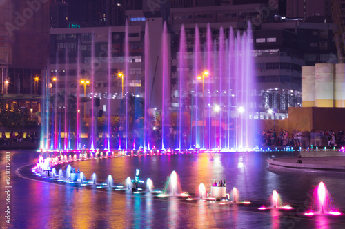 Beautiful blue and violet fountain in the night