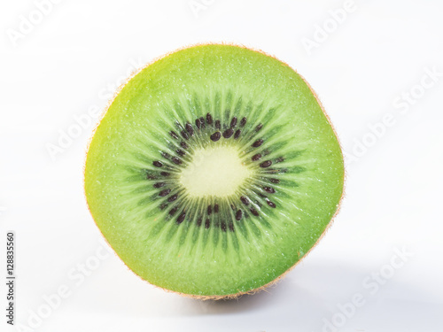 Cross section of ripe kiwi isolated on white background