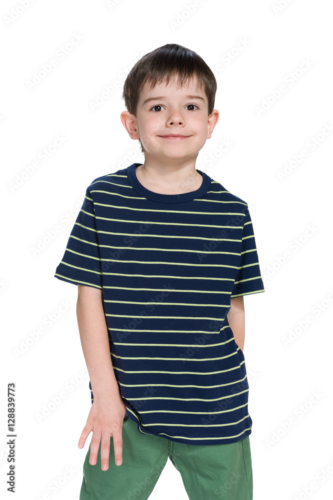 Smiling little boy against the white Smiling little boy against the white