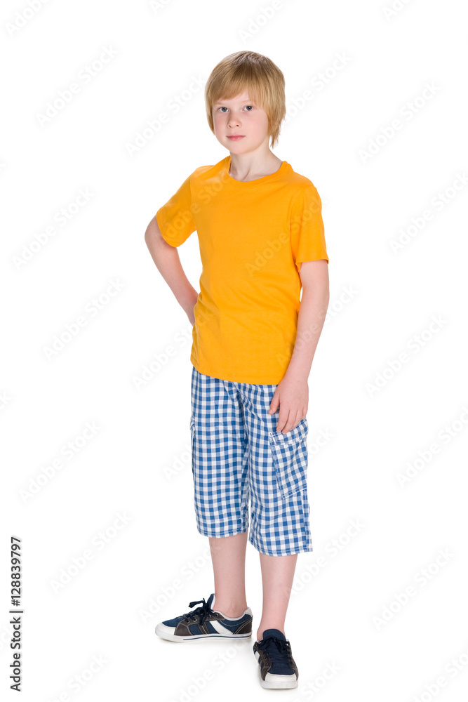 Serious little boy against the white Serious little boy against the white